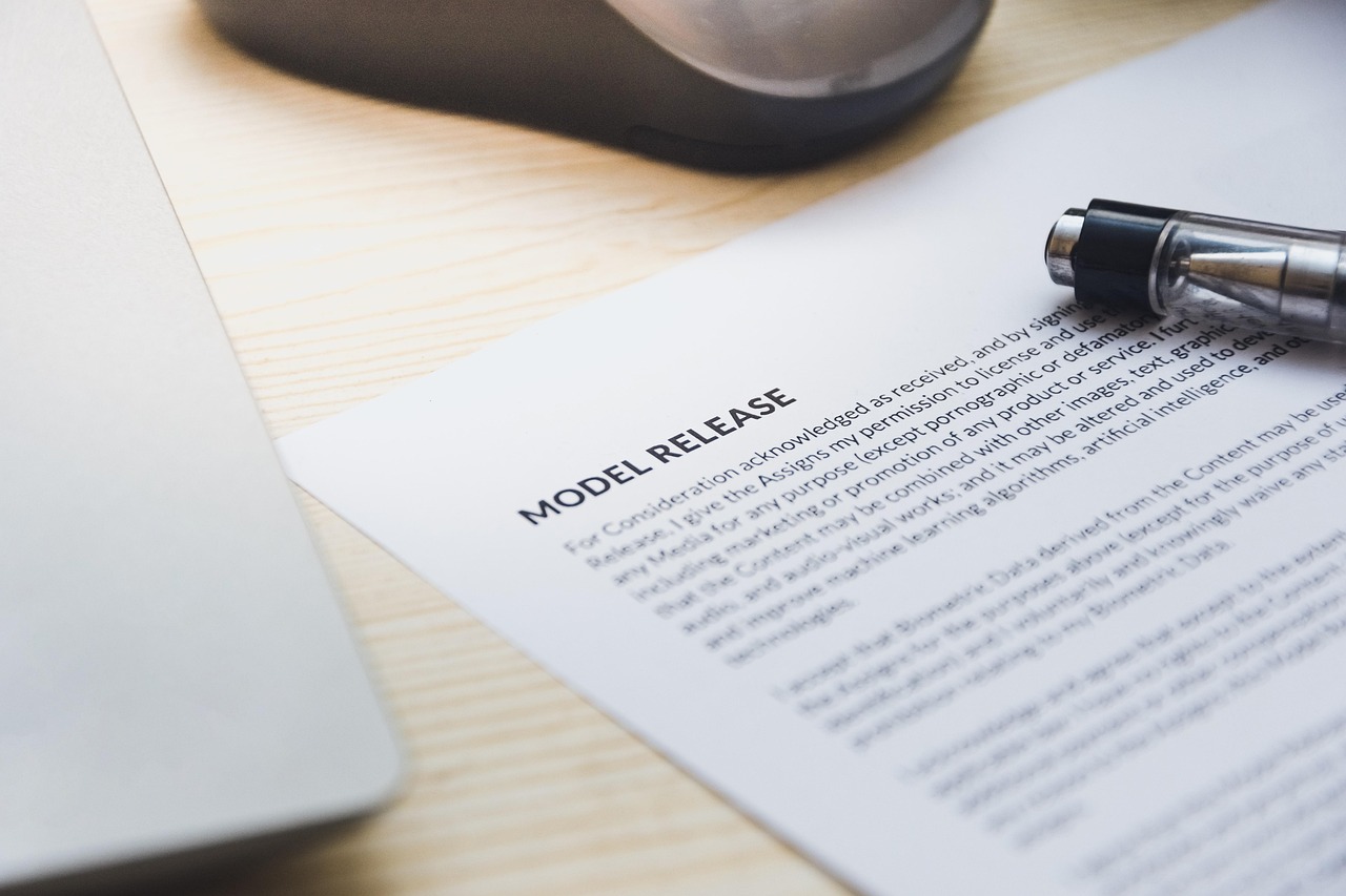 financial advisor reviewing and signing a client notification letter