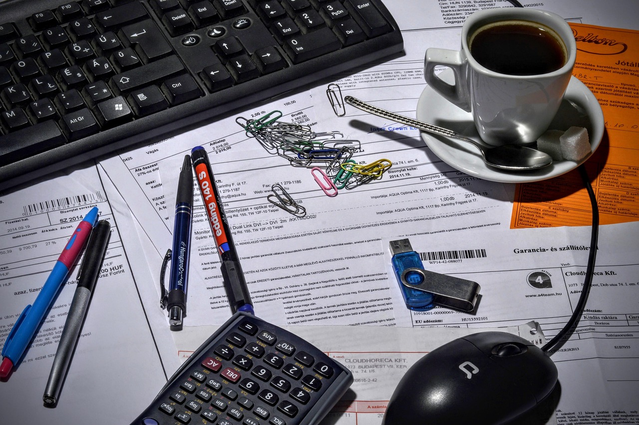 financial advisor reviewing client transition documents and strategy notes